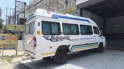 Purvi Car Rental | Tempo Traveller